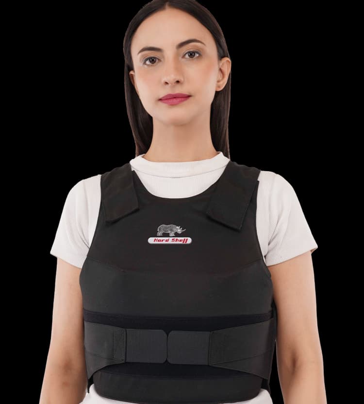 Woman wearing Hard Shell Vixen Vest for female ballistic protection, designed for comfort, mobility, and safety.